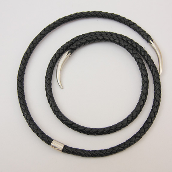 Vicky Forrester, Original hand made jewellery experiences. Designed and made by hand. Each piece is hand crafted and exists as an original. Gold silver special  jewellery gifts. Made at my Flux in South London. These contemporary jewellery forms exist unique pieces as one a part of my exclusive one off bespoke jewellery collections.Vicky Forrester. Style: Dress up, dress down Impact: Edgy, powerful, seductive. Mood:&nbsp;Goddess status - playful. dominatrix. Twisted Saturday night fever Reference: Melusine, Minoan Snake goddess, Mami Wata