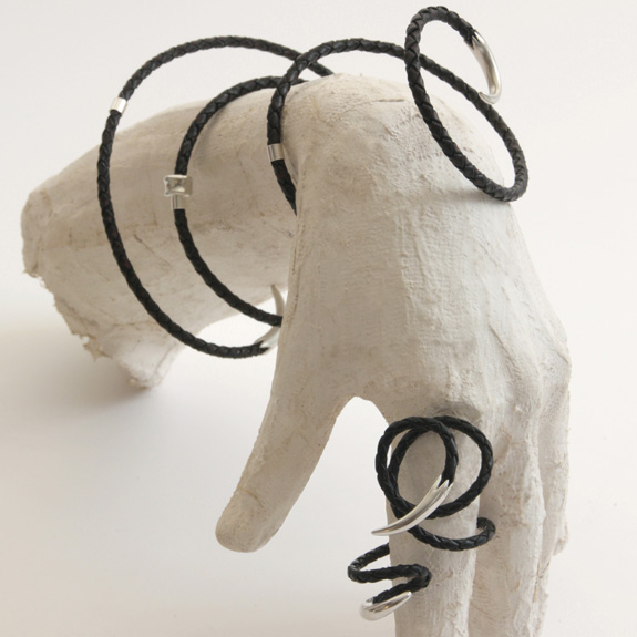 Vicky Forrester, Original hand made jewellery experiences. Designed and made by hand. Each piece is hand crafted and exists as an original. Gold silver special  jewellery gifts. Made at my Flux in South London. These contemporary jewellery forms exist unique pieces as one a part of my exclusive one off bespoke jewellery collections.Vicky Forrester. Style: Dress up, dress down Impact: Edgy, powerful, seductive. Mood: Goddess status - playful. dominatrix. Twisted Saturday night fever Reference: Melusine, Minoan Snake goddess, Mami Wata